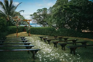 An outdoor wedding right by the beach.
